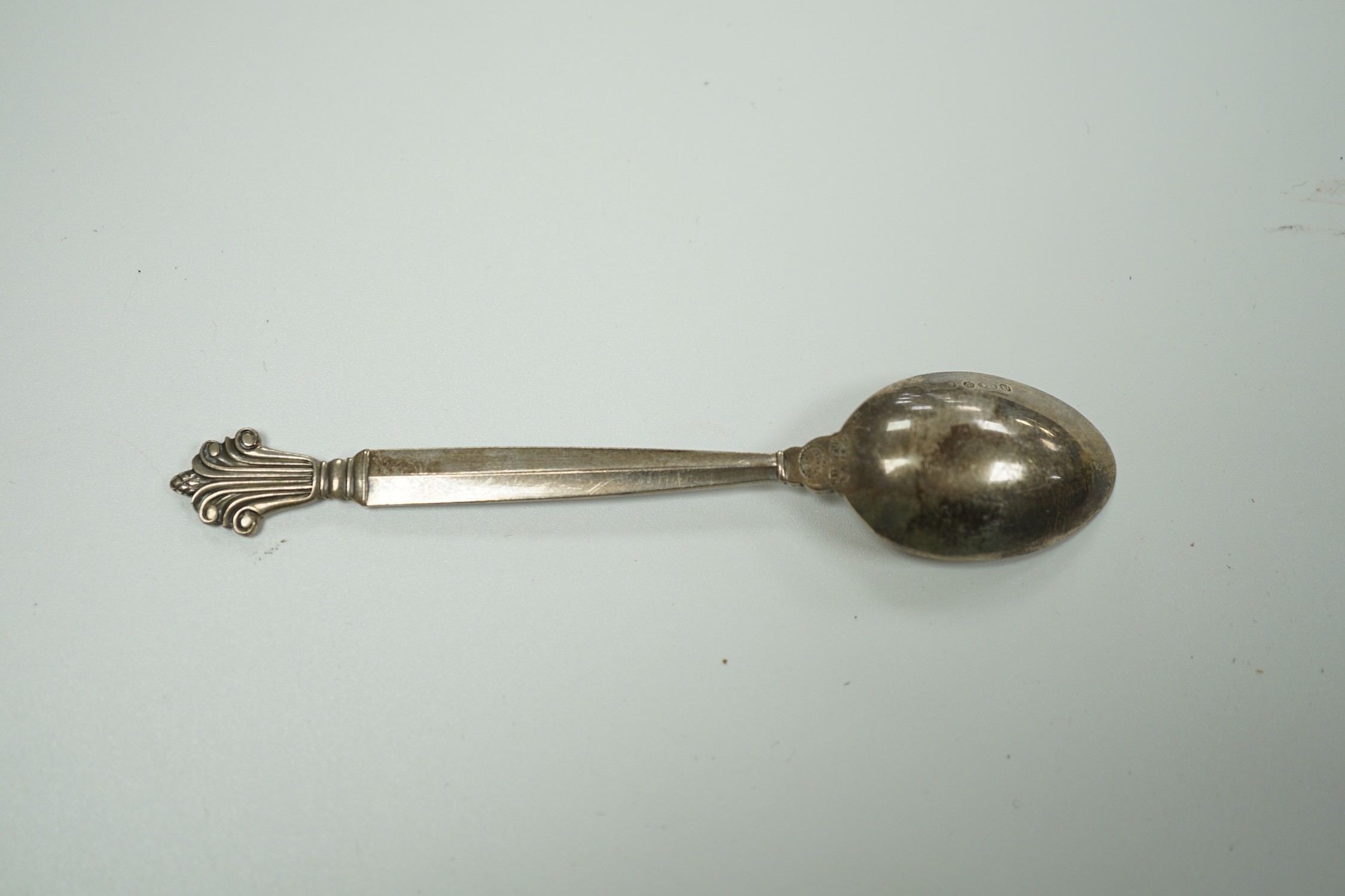 A set of nine 1950's Georg Jensen sterling coffee spoons, with London import marks and Georg Jensen box, 94mm, 93 grams.
